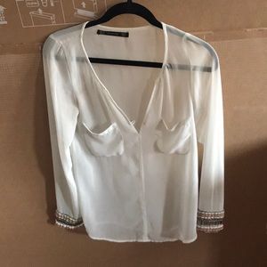 Size XS, cream sheer long sleeve shirt from Zara.